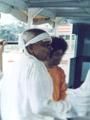 A bandaged Kasturi with Swami